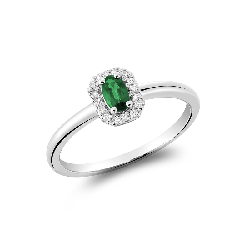 Petite bague a diamants et pierre de couleur.