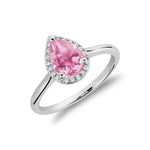 Bague à diamants et pierre de couleur.